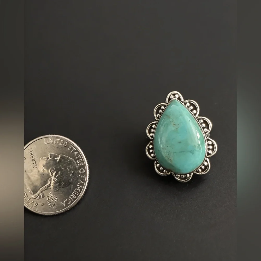 Genuine kingmanTurquoise‎ Teardrop ring set in Sterling silver intricate setting